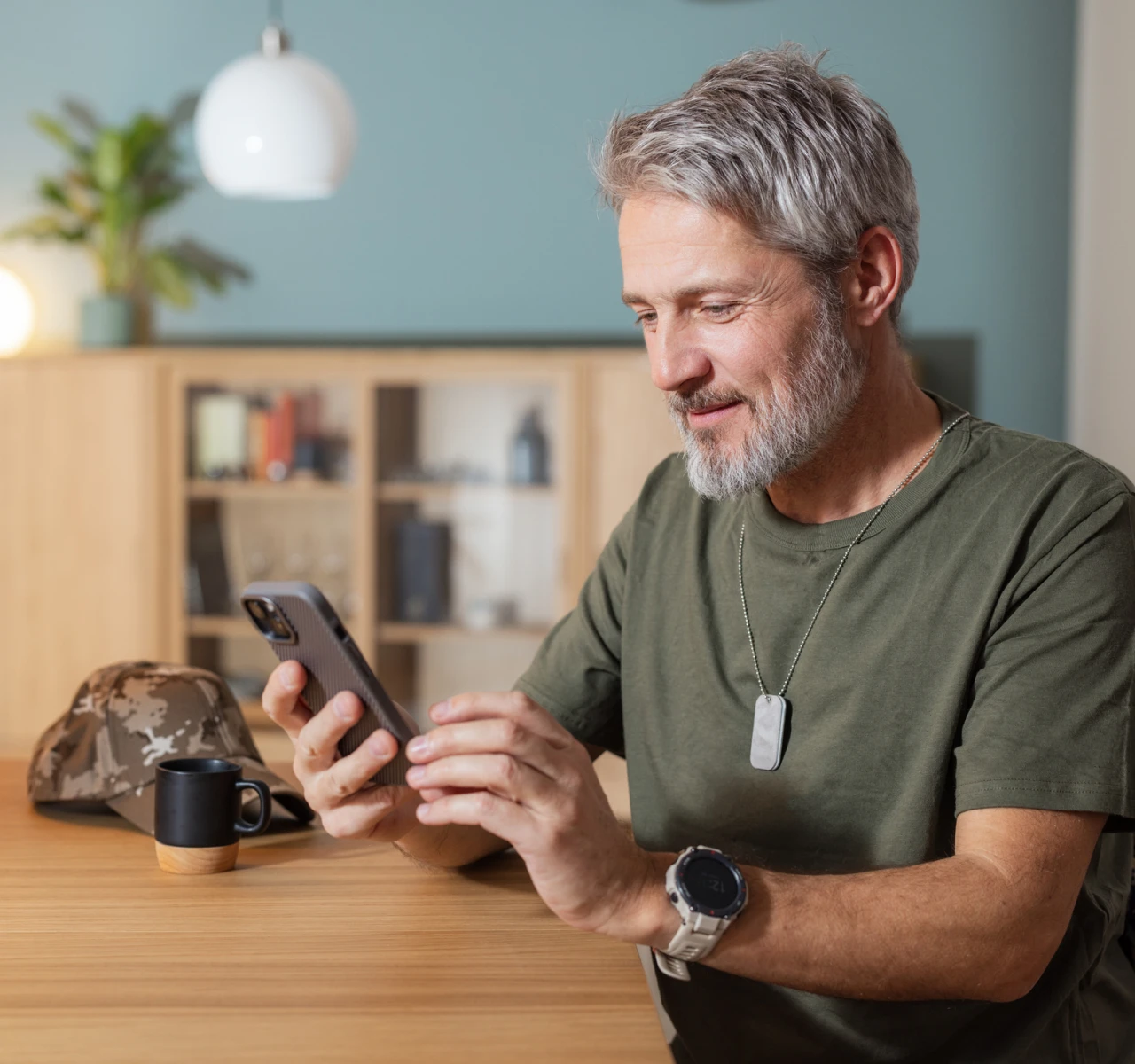 Casual man checking phone